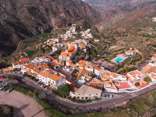 Preview: Drone view of city in mountain valley