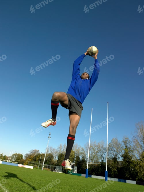 Preview: Rugby player catching ball