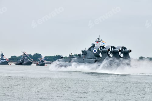 Preview: Hovercraft warship armed with armament sails into sea toward military target to attack and destroy