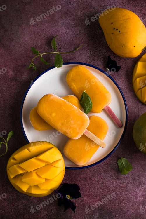 Preview: Mango banana popsicles with fresh fruits, flat lay top view