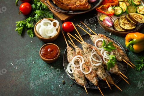 Preview: Homemade Kofta kebabs, grilled steak and grilled vegetables on a skewer with vegetables