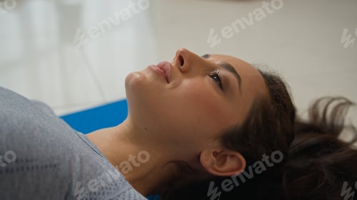 Preview: Caucasian woman relax female yogi girl sportswoman enjoy massage roller equipment for myofascial