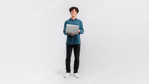 Preview: Guy Holding Laptop Surfing Web On Light Gray Background