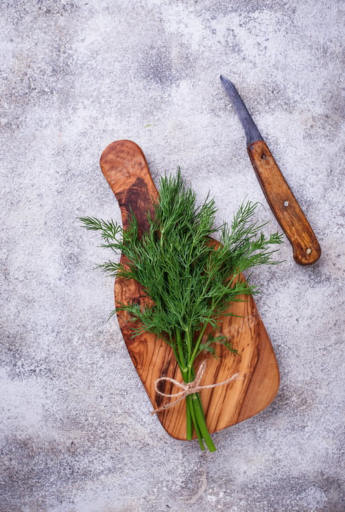 Preview: Fresh dill on cutting board