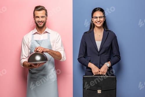 Preview: happy man in apron with Serving Tray and businesswoman with briefcase on blue and pink