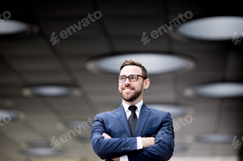 Preview: Smiling man crossing hands