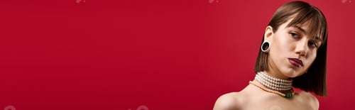 Preview: Young woman showcases modern fashion with elegant accessories against a vibrant backdrop