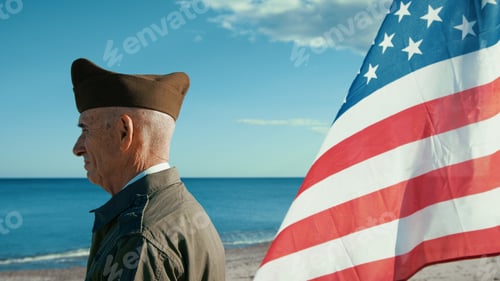 Preview: United States Navy Veteran Is Moved Looking At The Ocean With American Flag
