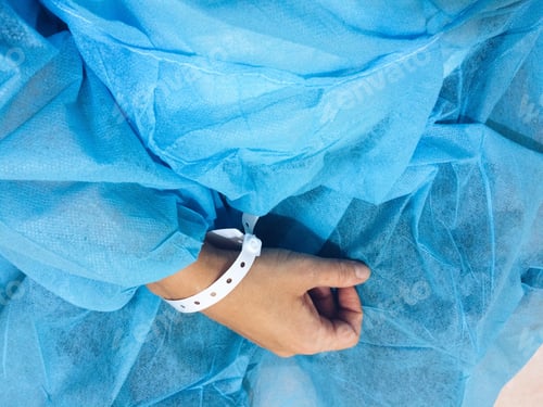 Preview: Personal perspective woman at the doctors office with the hand bracelet