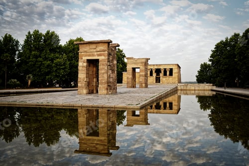 Preview: Debod Egyptian temple in Madrid, Spain with clouds reflected in the pond