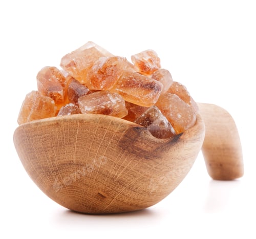 Preview: Brown cane caramelized lump sugar in wooden bowl isolated on white background cutout
