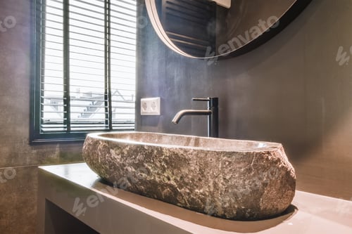 Preview: Modern stone vessel sink in bathroom