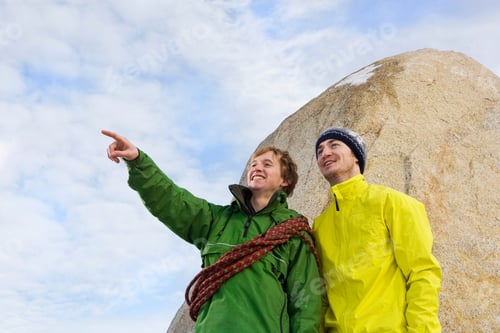 Preview: Portrait of 2 climbers, one pointing