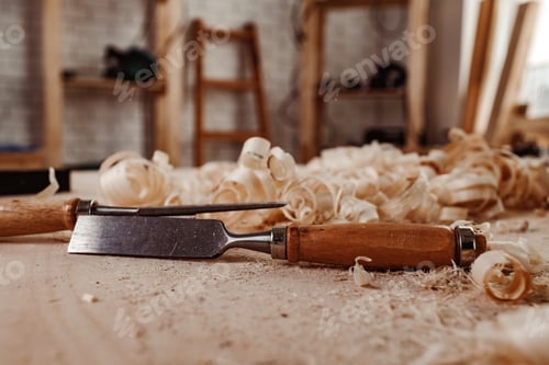Preview: Carpenter's chisel, woodwork tool on the desktop in the workshop