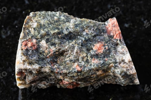 Preview: sample of raw gneissoid granite mineral on black