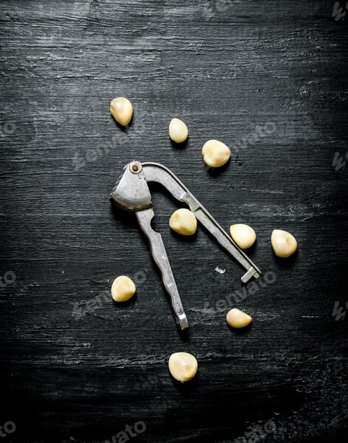 Preview: Fresh garlic On black chalkboard.