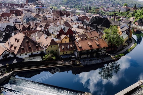 Preview: Aerial view of Cesky Krumlov's historic rooftops and river.