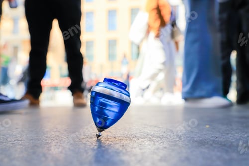 Preview: Rope game called Blue Top Rolling on the Floor used by a child