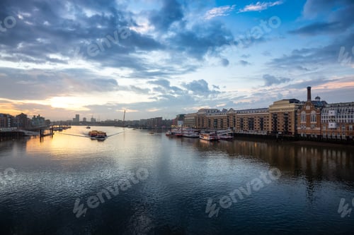 Preview: View of River Thames and City Skyline during dramatic sunrise. City of London