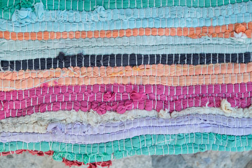 Preview: Close-up of rug woven from colored threads