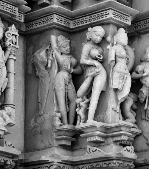 Preview: Sculpture of erotic woman on Khajuraho Temple.