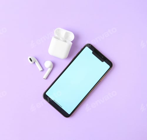 Preview: Wireless earphones, mobile phone and charging case on violet background, flat lay. Space for text