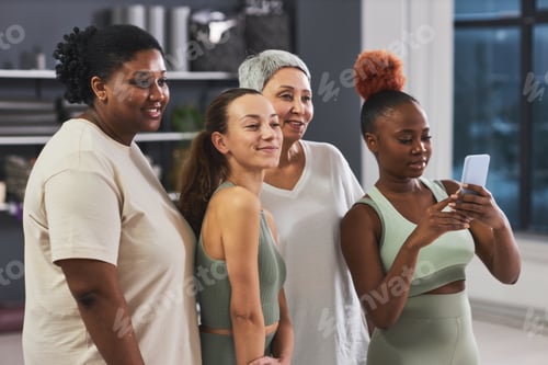 Preview: Women posing on camera of smartphone