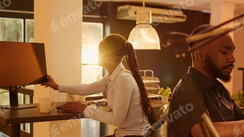Preview: Company worker waving goodbye at coworker leaving office
