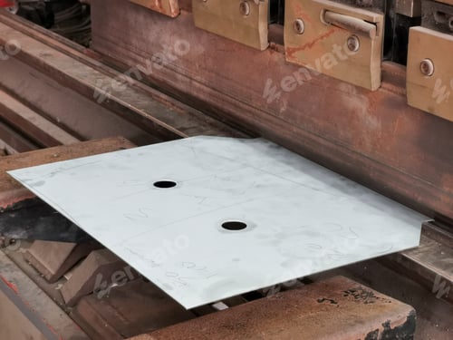 Preview: Image of a metal plate bending with industrial machine.