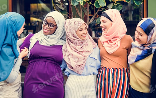 Preview: Group of islamic friends arms around and smiling together