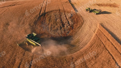 Preview: Combine harvester working on a wheat field