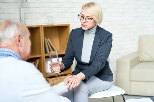 Preview: Nursing woman caring for senior patient