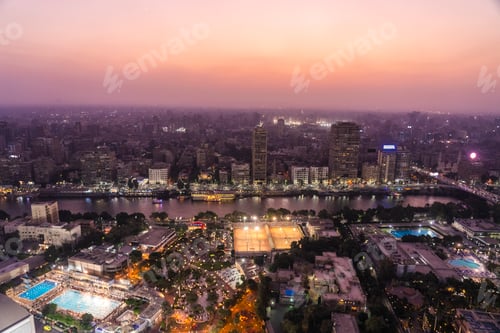 Preview: Egypt, Cairo, Aerial view of cityscape and Nile river at dusk