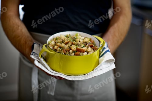 Preview: Chef displaying savory Thanksgiving turkey stuffing