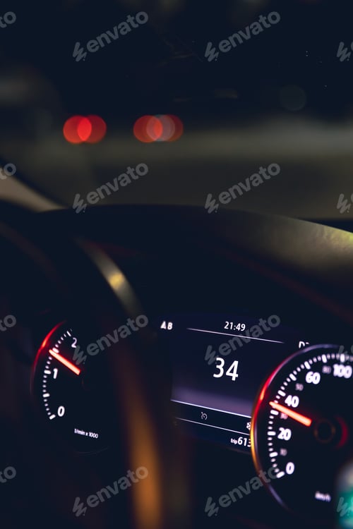 Preview: Close-up, car speed indicators in a car at night.