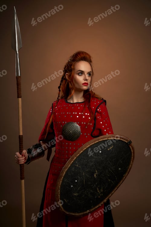 Preview: Female warrior keeping spear and shield and posing