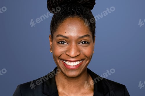 Preview: African-American woman smiling on blue background