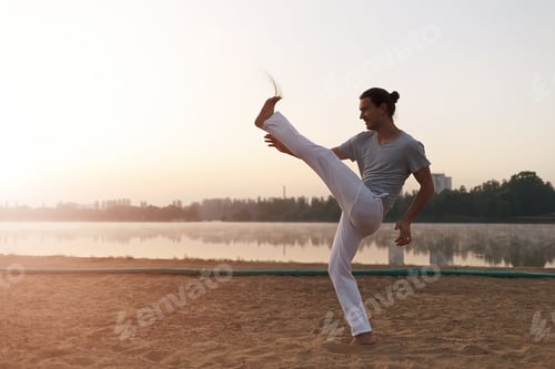 Preview: Capoeira on the beach, near lake in the park one performer, at s