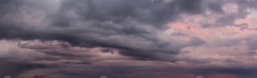 Preview: Cloudscape during a dark, rainy and colorful morning sunrise