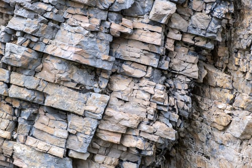 Preview: Layered empty rock, limestone, sandstone, slate formation background, texture. Copy space