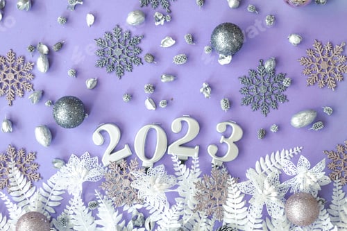 Preview: Lilac Christmas background with numbers 2023 and decor details, flat lay.