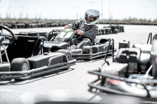 Preview: Man driving kart on the track