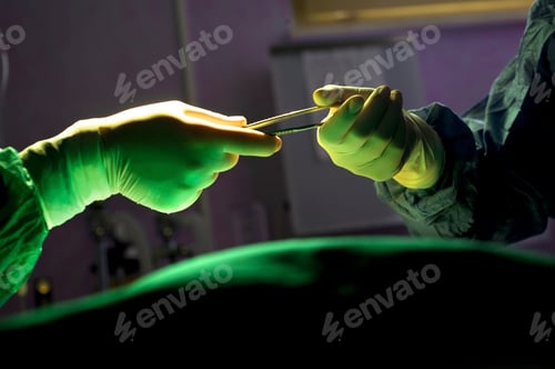 Preview: Surgeons performing an operation under green light