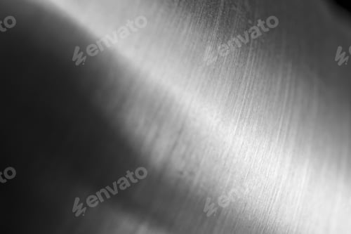 Preview: Abstract metal macro background with selective focus. Silver metallic texture, close-up