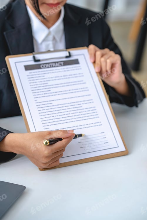 Preview: insurance officer signing car insurance document or lease paper contract or agreement. Buying or sel