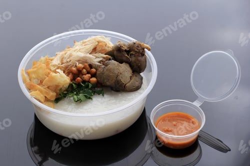Preview: Bubur Ayam or Indonesian Rice Porridgew with Shredded Chicken.