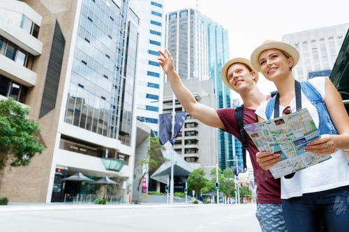 Preview: Two Tourists Calling For A Taxi In The City