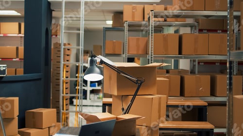 Preview: Empty office space in storage room warehouse filled with cardboard packages