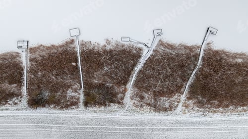Preview: Aerial view of fishing spot on frozen lake.