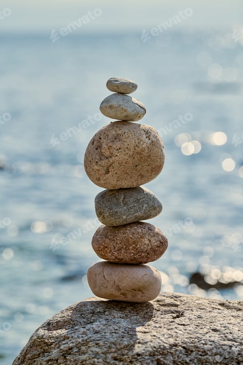Preview: Balanced Stones by Seaside Creating Serene Scene